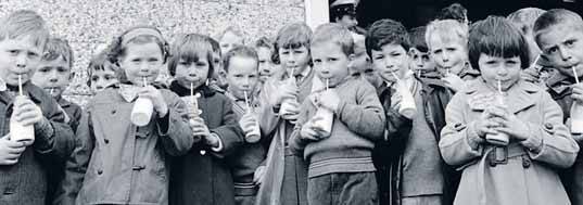 DRINK UP: Students were told to drink milk in the milk shed at Hamilton Public School in the 1950s.