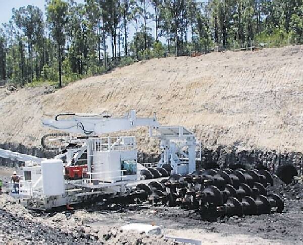 TRUCKLOAD: Centennial Coal's auger operation at its Fassifern mine.  TECHNIQUE: The mining equipment Centennial used in its Fassifern operation.