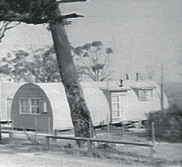 BATTLE: Nissen huts in Belmont North soon after they were built.