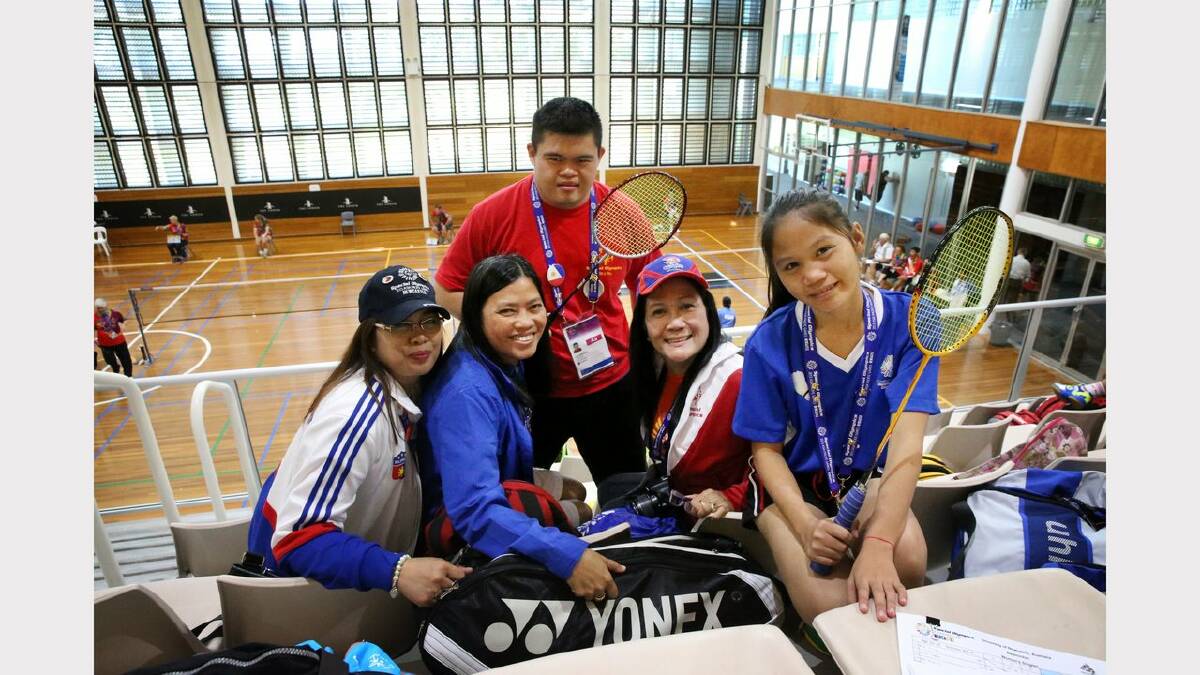 Action from Day 2 of the Special Olympics. Badminton at The Forum, Newcastle University. From the Philippines, from left,  Edna Magada (head coach), Carolina Ambray (coach), Andrew Lim, athlete, Dominica Parcia (staff asssistant) and Gia Gestopa, athlete. Picture Dean Osland