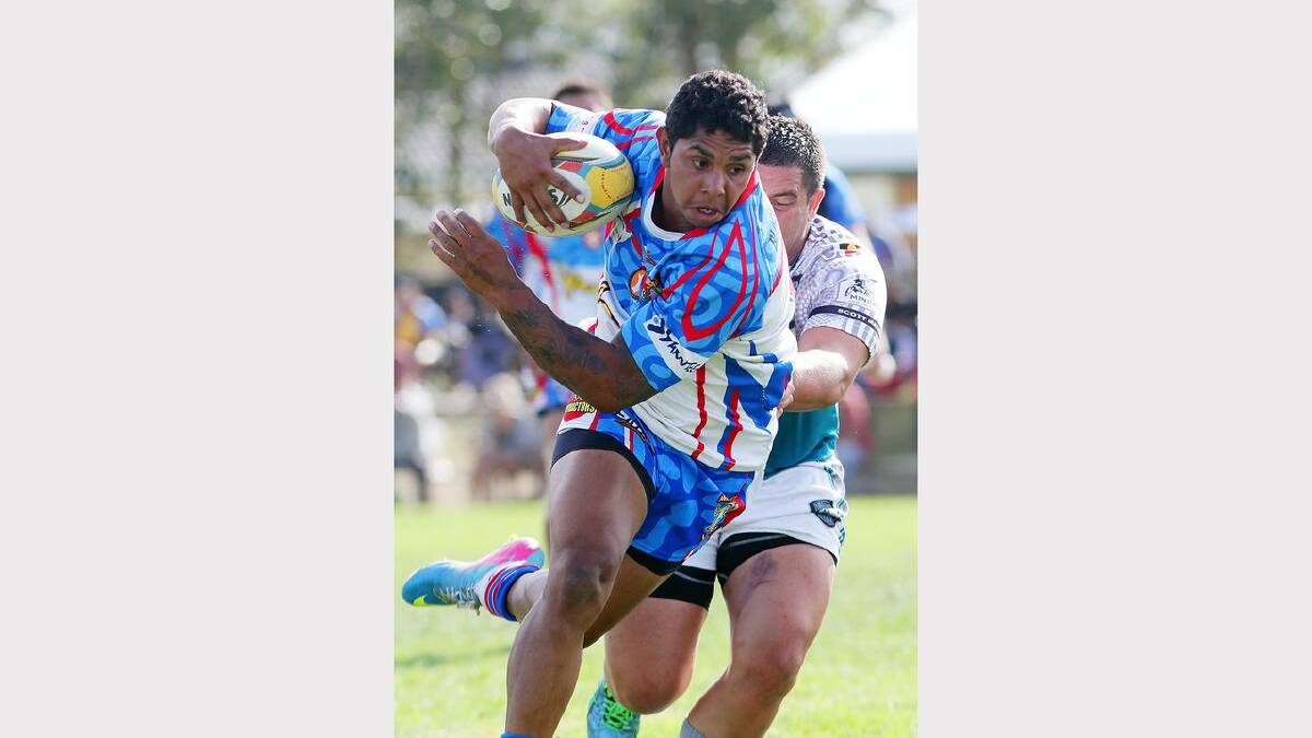 Action from on and off field at the Koori Knockout Cup at Lakeside sporting complex on Monday. Albert Kelly on field. Picture Ryan Osland