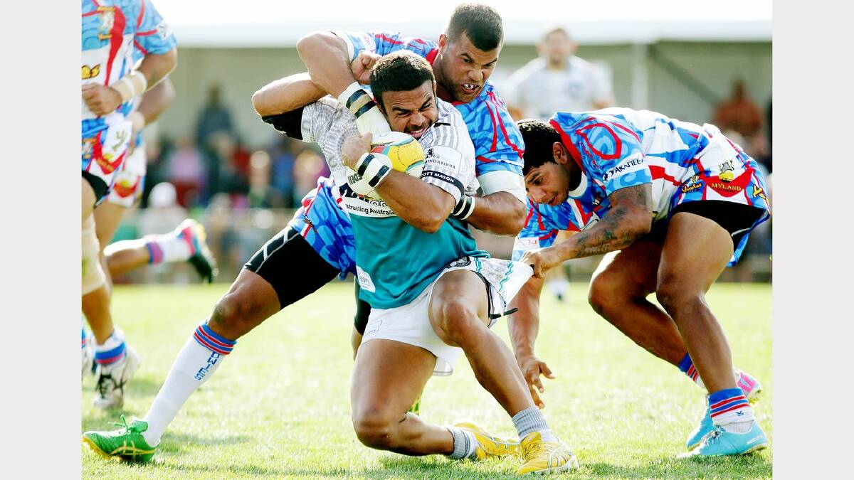 Action from on and off field at the Koori Knockout Cup at Lakeside sporting complex on Monday. Picture Ryan Osland