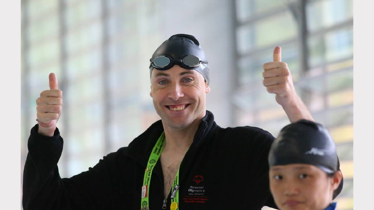 Scenes from the Special Olympics swimming at The Forum pool.  Gold medal winner 25m butterfly Tim Rieger of NZ team. Picture: Dean Osland. 
