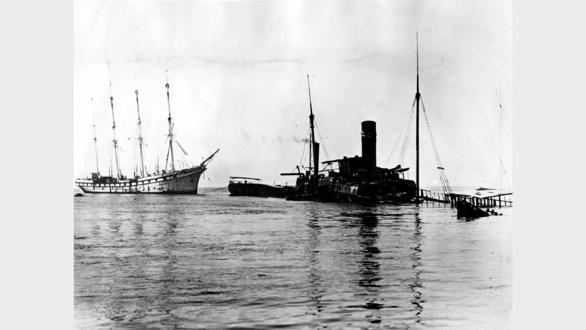 The French barque Adolphe on the Oyster Bank before the craft began to disintegrate. At right are the two hulka Katoomba and Elamang. 