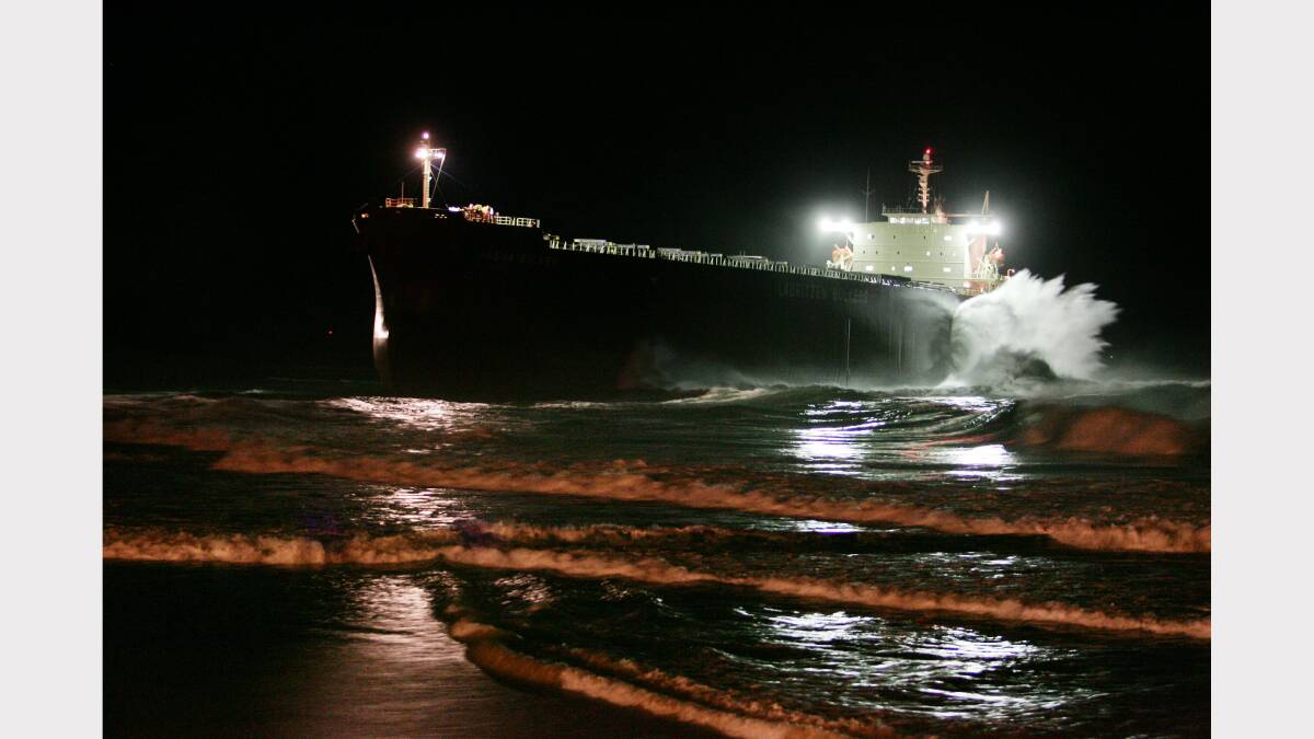 40,000 tonne bulk carrier Pasha Bulker aground at Nobbys Beach Newcasle onlookers flock in the tens of thousands even into the night just to get a glimpse of the ship 11th June 2007 Picture by DEAN OSLAND 