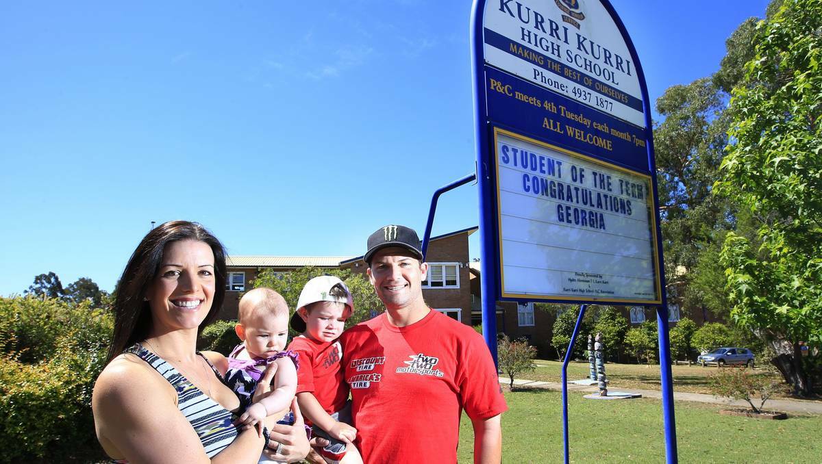 YOUNG LOVE: Chad Reed and wife Ellie, pictured with children Tate and Kiah, met at Kurri Kurri High School.  Picture: Peter Stoop