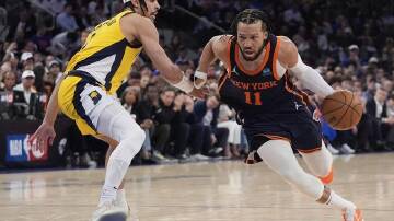 Jalen Brunson (11) returned after suffering a foot injury to guide the Knicks past the Pacers. (AP PHOTO)